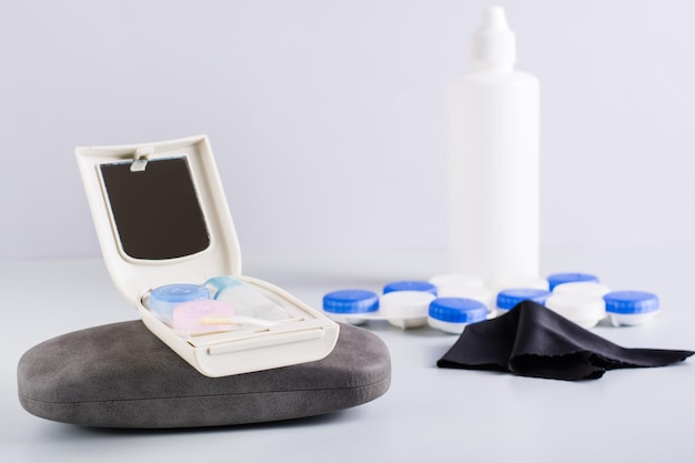 Travel set for storing contact lenses on a case for glasses Alternative for vision correction