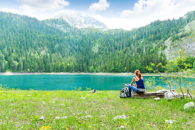 Traveler is resting at the lake