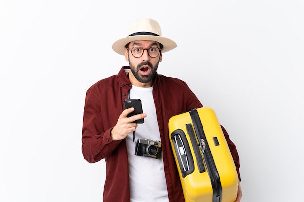 Photo traveler man with suitcase