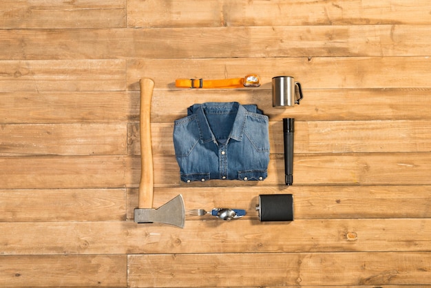 Traveler set on wooden background flat lay