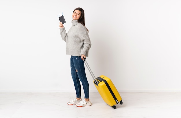 Traveler woman with a suitcase