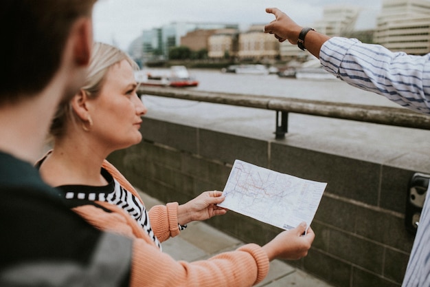 Travelers asking a local for direction