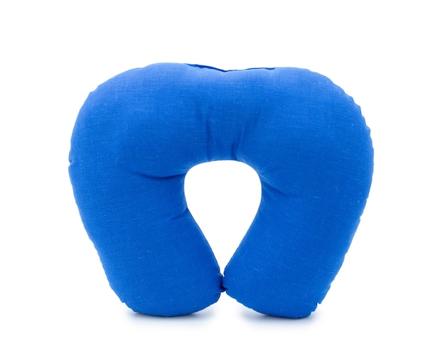 Traveling blue sleeping pillow, Blue neck pillow isolated on white space