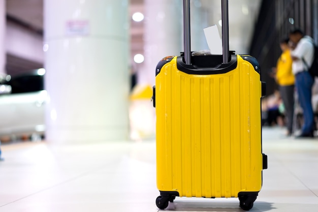 Traveling luggage in airport terminal 