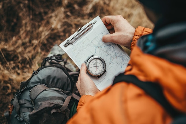 Traveller looking at stopwatch technology for tracking activity