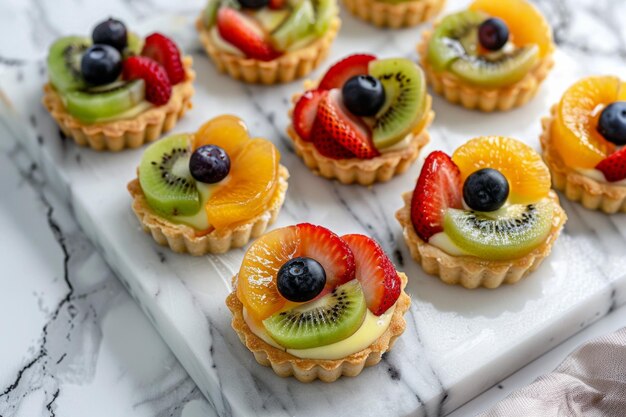 Tray of Fruit Tarts on Marble Table