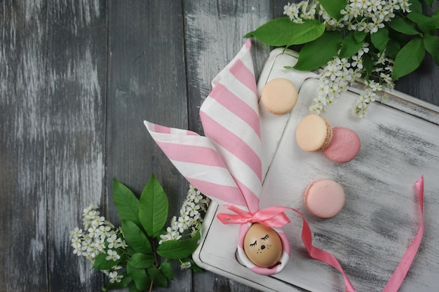 On the tray is an Easter egg decorated with a napkin. Hand made for Easter decoration