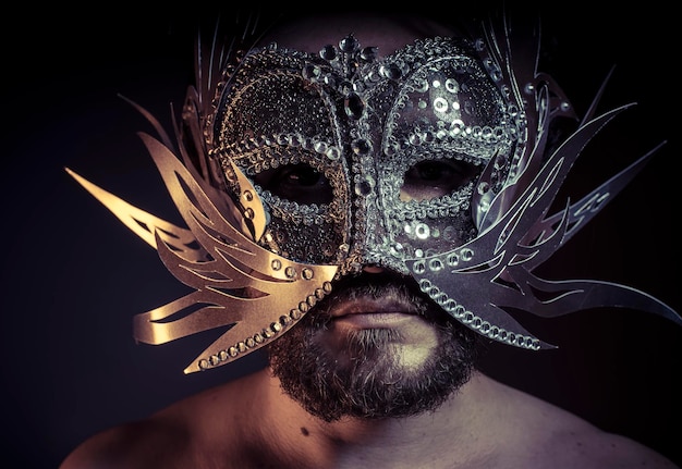 Treasure, jewels and silver. Man with mask of precious metals