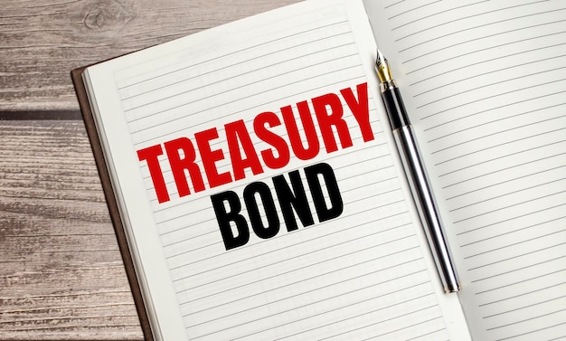 Treasury bond text on a notepad with pen business