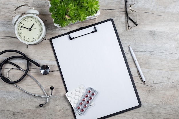 Treatment plan for a patient doctors desk top view