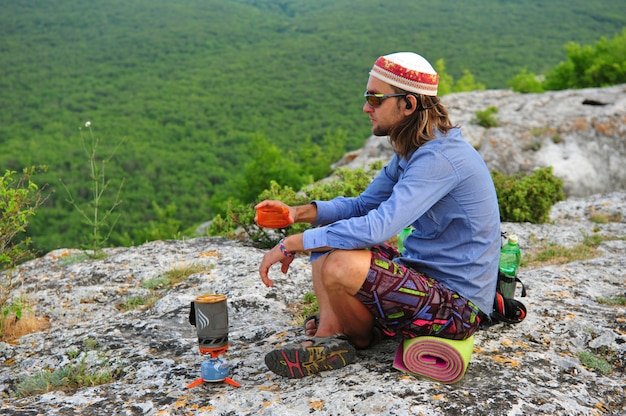 trekking man at the top of mountain in Crimea