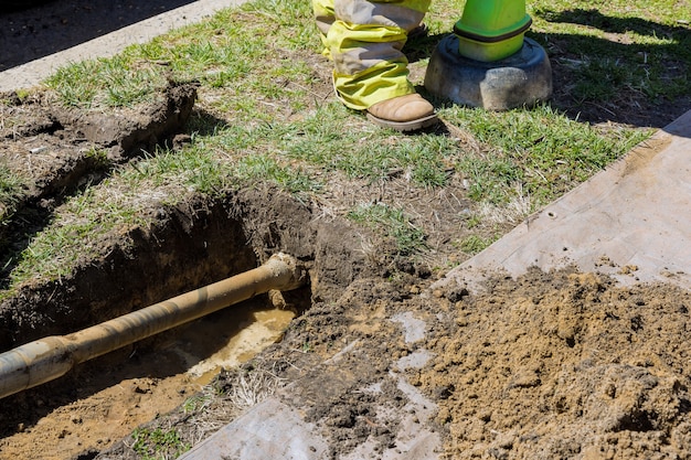 Trenchless laying of communications, fiber optic and water pipes with horizontal directional drilling technology machine work process