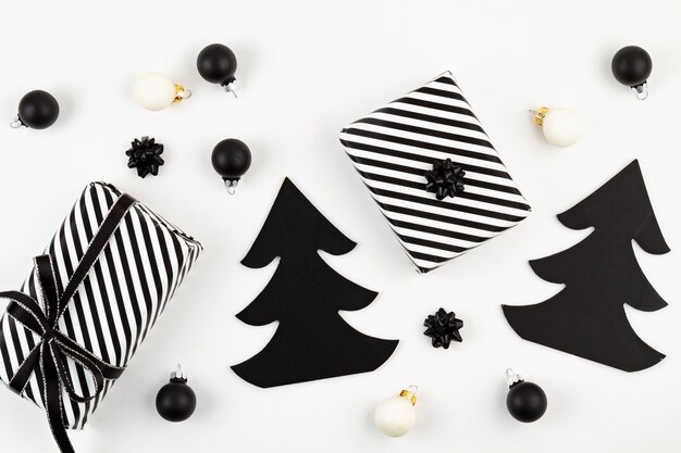 Trendy fashionable christmas decoration with gifts in black and white colors