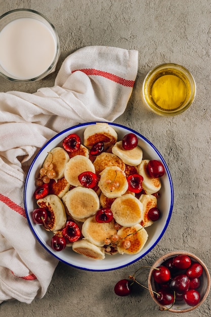 Trendy home breakfast with tiny pancakes