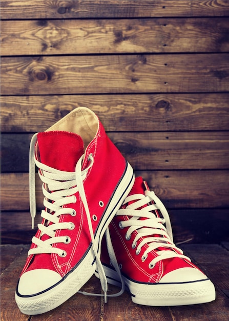 Trendy red shoes on background