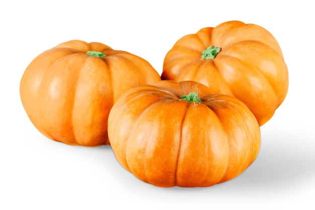 Trhee orange pumpkins isolated on white background