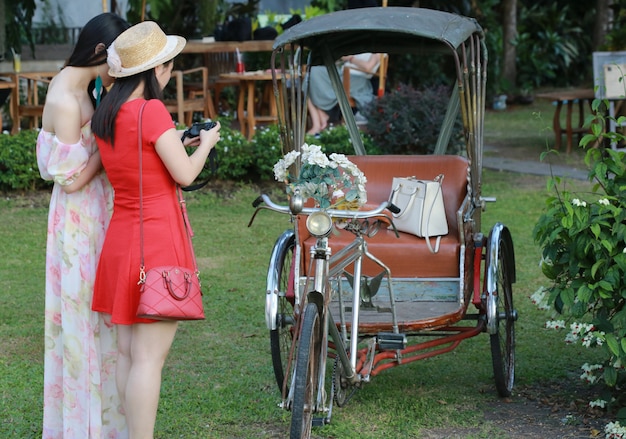 Tricycle with women , Chiang Mai, Thailand