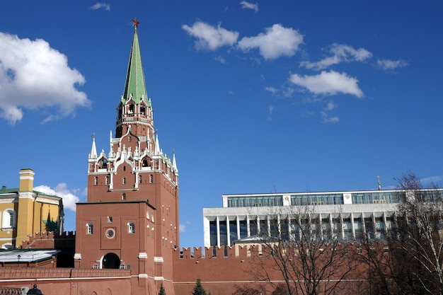 Trinity tower of the Moscow Kremlin and the State Kremlin Palace on spring sunny day