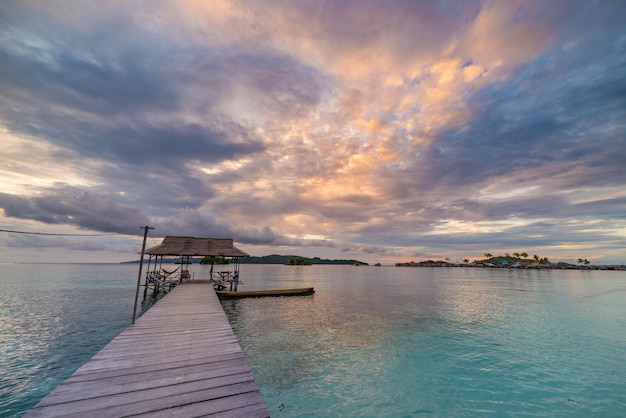 Tropical beach, caribbean sea, transparent turquoise water, remote Togean Islands, Sulawesi, Indonesia.