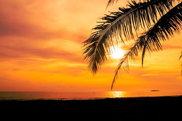 Tropical beach sunset with orange sky