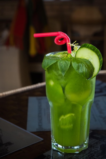 Tropical green cocktail with lemon and fresh mint