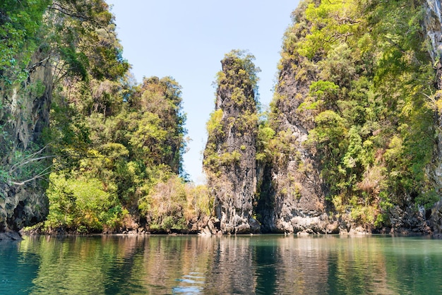 Tropical landscape of sea lagoon with rock islands and green water. Krabi, Thailand