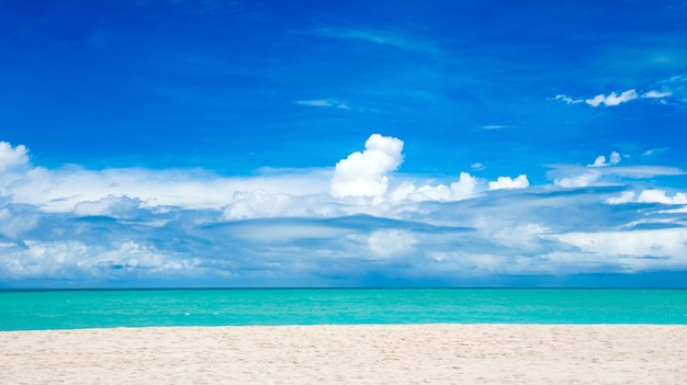 Tropical Maldives island with white sandy beach and sea