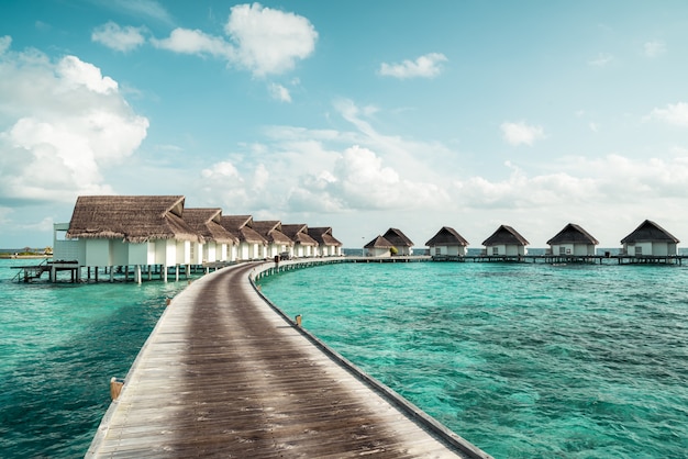 tropical Maldives resort hotel and island with beach and sea 