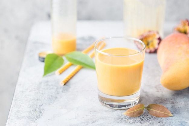 Tropical mango smoothie in a glass ready to be served