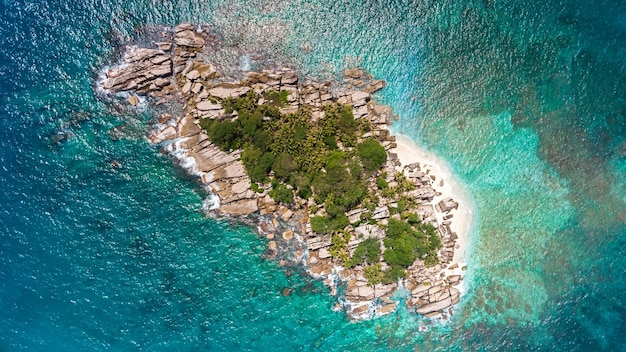 Tropical Seychelles aerial of island in sea vacation concept