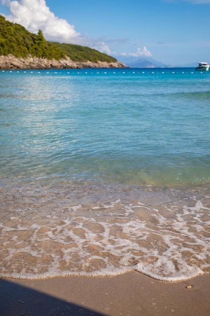 Trsteno beach in montenegro near budva in a beautiful bay with blue water