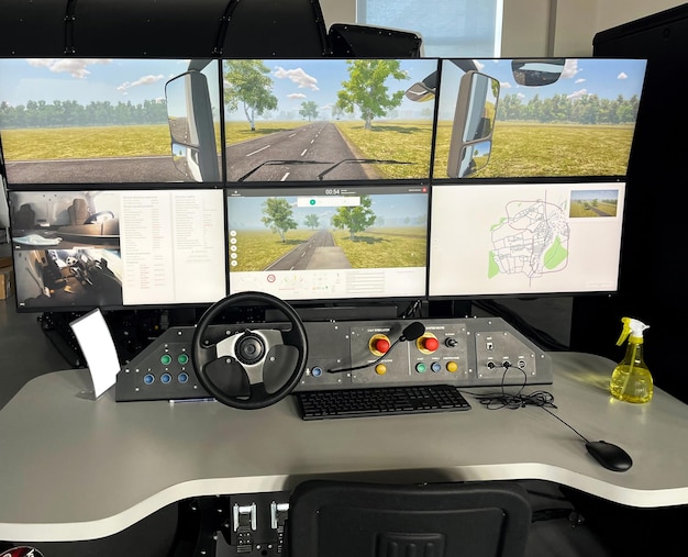 Truck driving simulator. View of computers setting the difficulty level of driving simulator