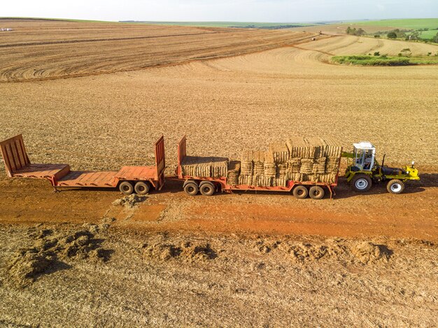 Truck loaded with bales of dry leaf sugar cane