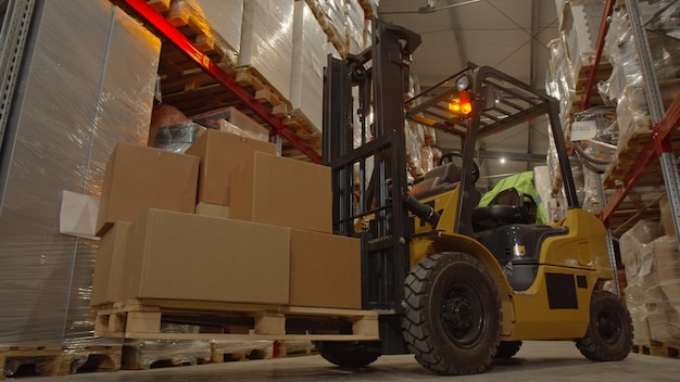 Truck in the warehouse Boxes on the shelves in the background