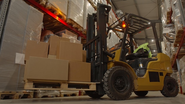 Truck in the warehouse Boxes on the shelves in the background