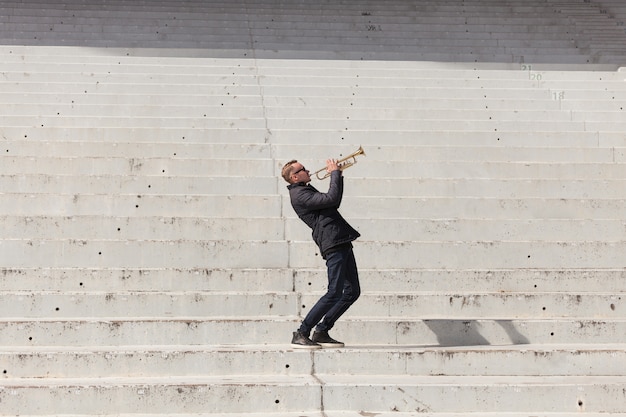 Trumpet player in stadium