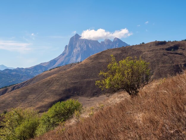 TseyLoam Mountain Ingushetia Autumn mountain landscape with pointed rocks on a clear sunny day Autumn mountain landscape of Ingushetia