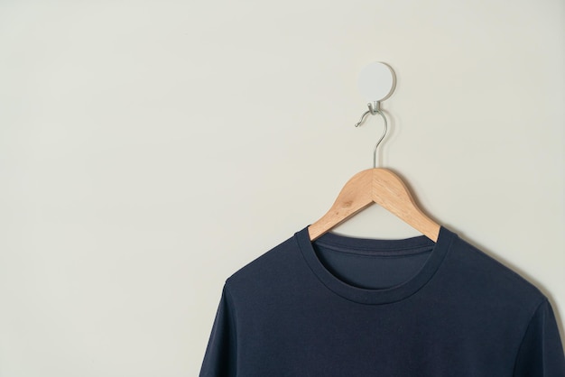 Tshirt hanging with wood hanger