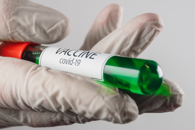 Tube with a sample of coronavirus vaccine