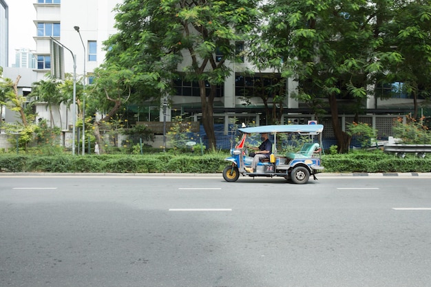 The Tuk Tuk running on the road in lumphine bangkok thailand