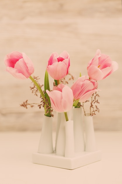 Tulips - bouquet pink tulips in vase, vanilla toned