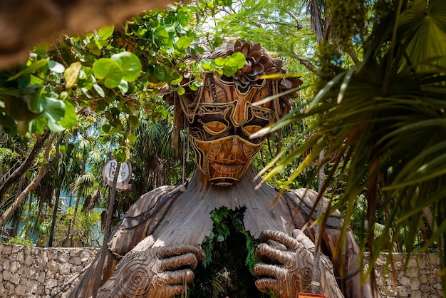 Tulum, Mexico. May 25, 2021. Ven a La luz sculpture installed at the beautiful resort Ahau next to a sign of cafe