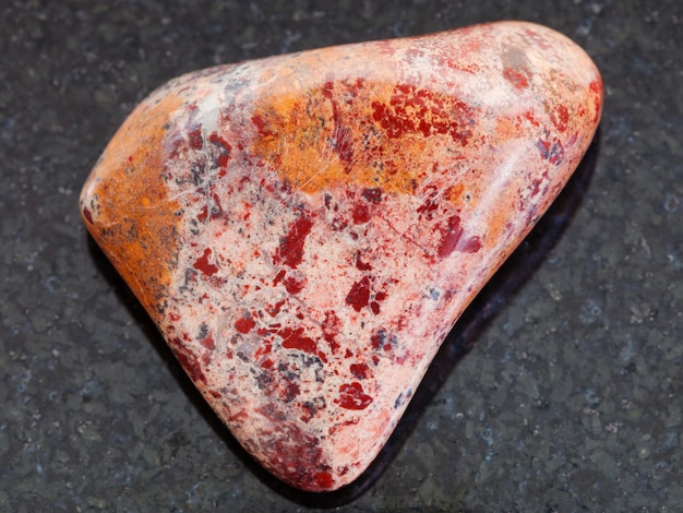 Tumbled Brecciated Jasper stone on dark