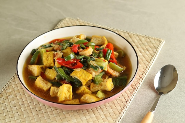 Tumis kacang panjang or stir fried long bean and tofu known as simple asian dish