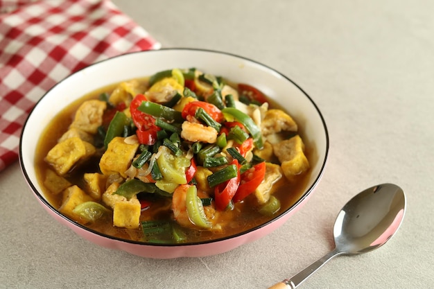 Tumis kacang panjang or stir fried long bean and tofu known as simple asian dish