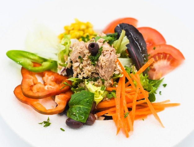 Tuna tomato carrot and black olives salad