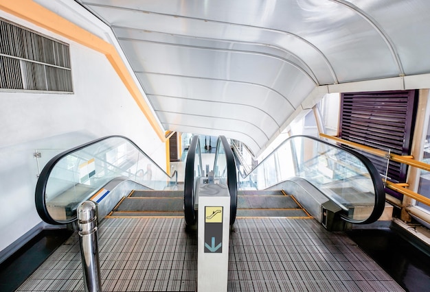 Tunnel escalator scroll down