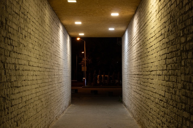 The tunnel is illuminated at night