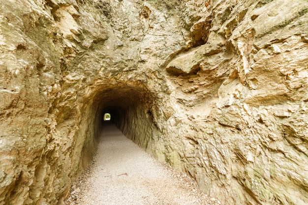 Tunnel of a Roman aqueduct carved into the rock of a mountain