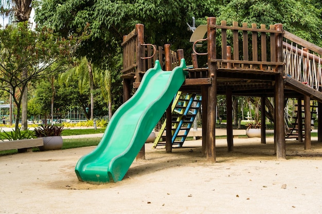 Tunnel and slider rustic and colorful playground for children in the park children's corner Recreation area